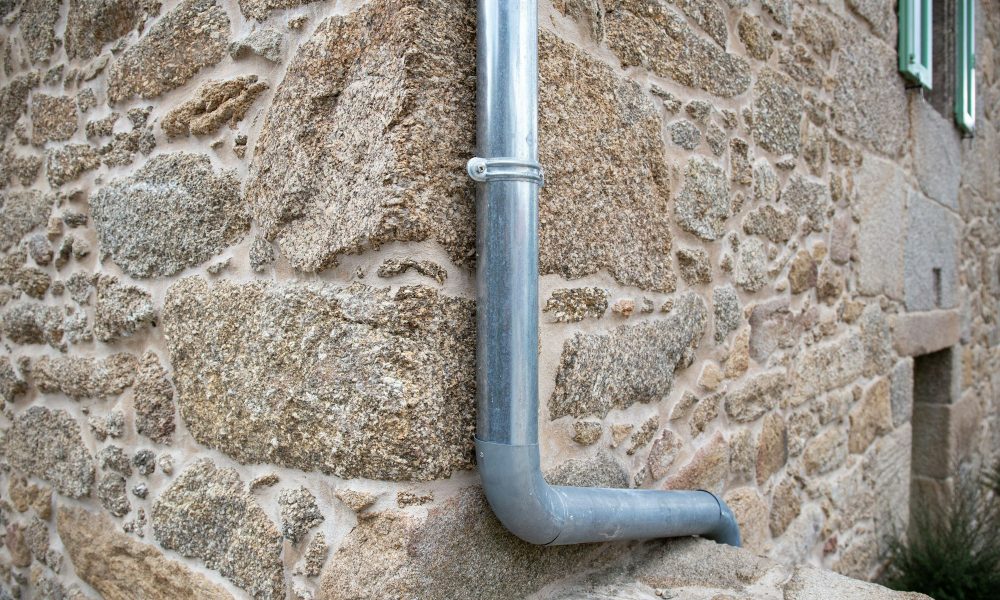 Rain Water Draining Gutter of a antique stone house. Galicia, Spain